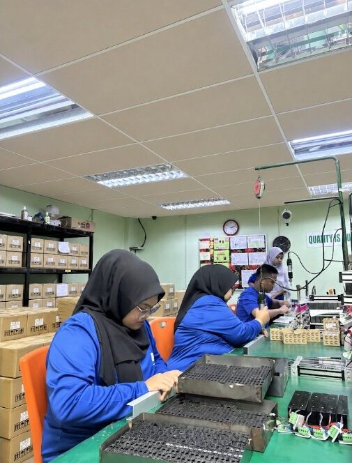 ESI Access staff assembling maglock components at the production benches