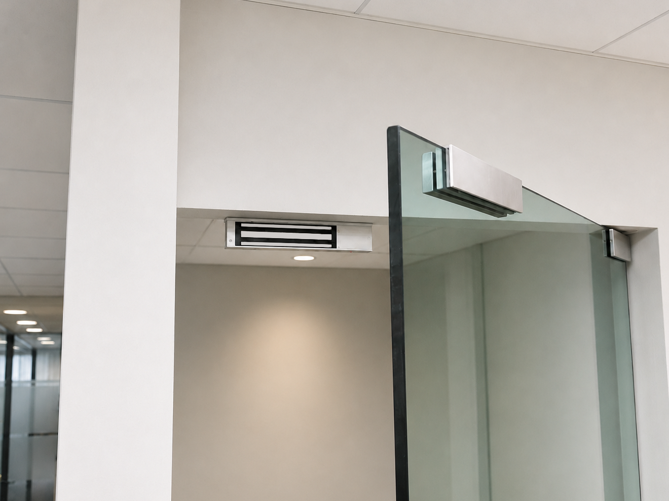 Indoor electromagnetic lock installed on a glass entrance door