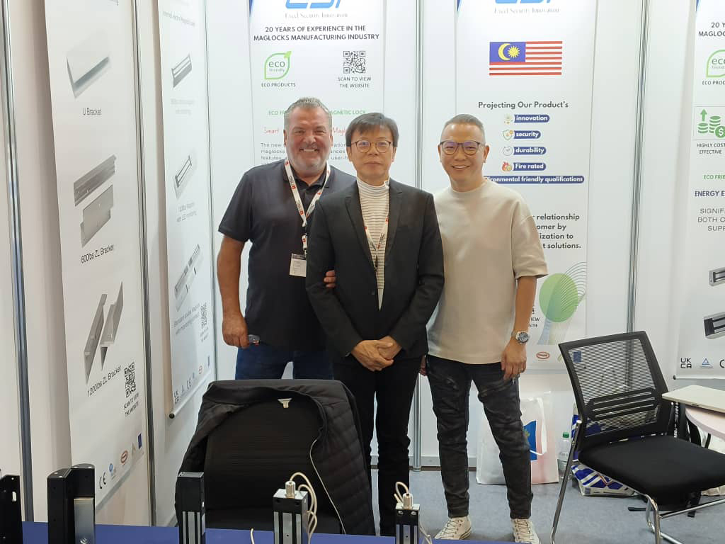 Visitors with the ESI Access team at the booth