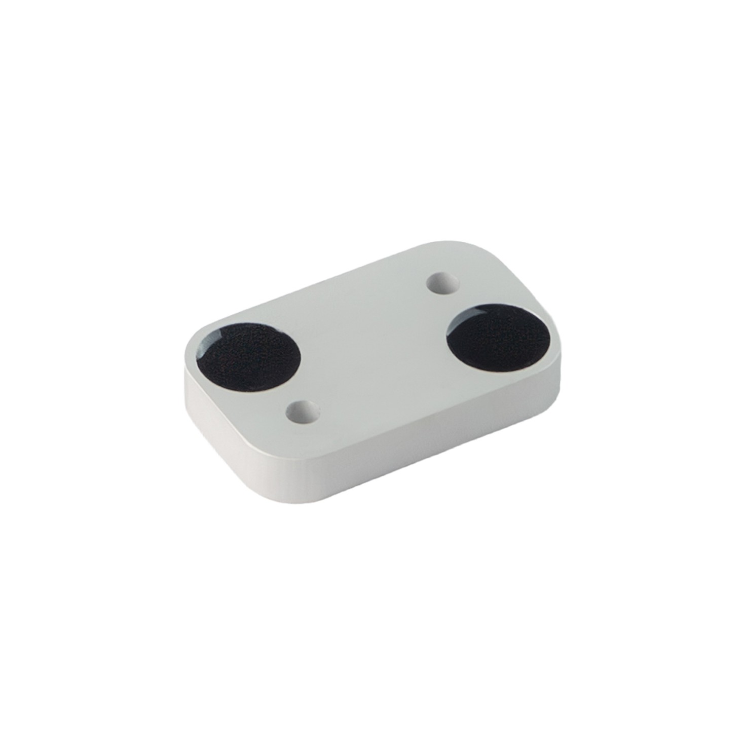 Photograph of a white mounting plate with two counterbored holes, the kind of picture a customer sends in